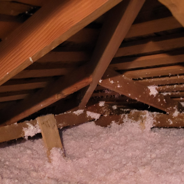 New blown-in insulation installed