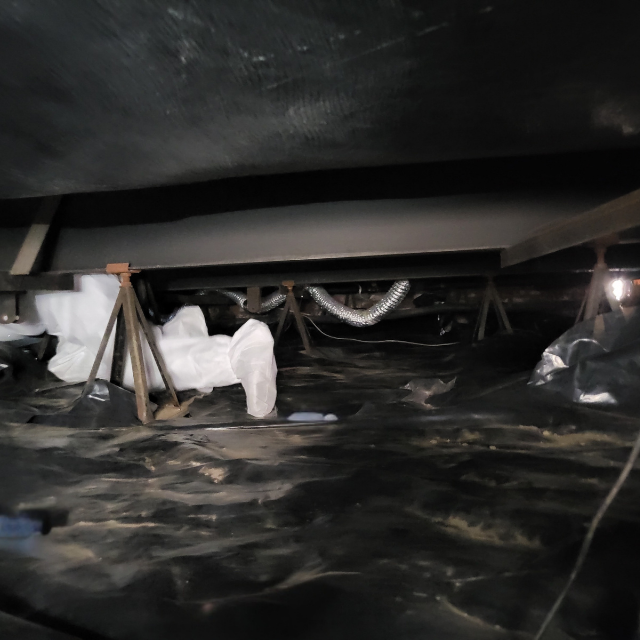 Crawl space vapour barrier installation